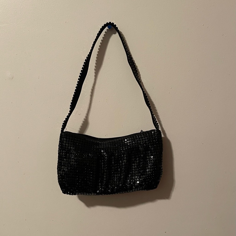 A black mini sequined purse